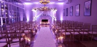 Copy of Solarium, ceremony chuppah w purple uplighting direct shot